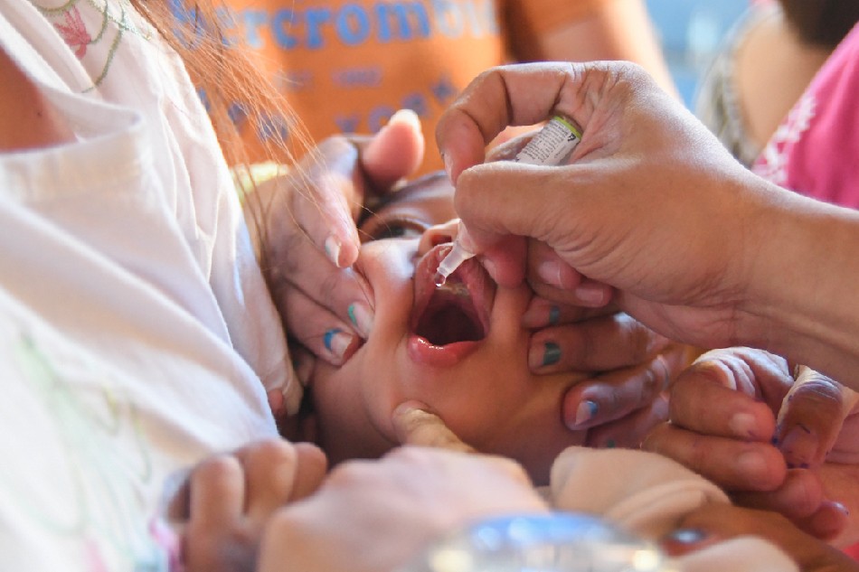 Children receive polio vaccine during a multi-regional mass immunization program in Quezon City on October 14, 2019. Mark Demayo, ABS-CBN News/file