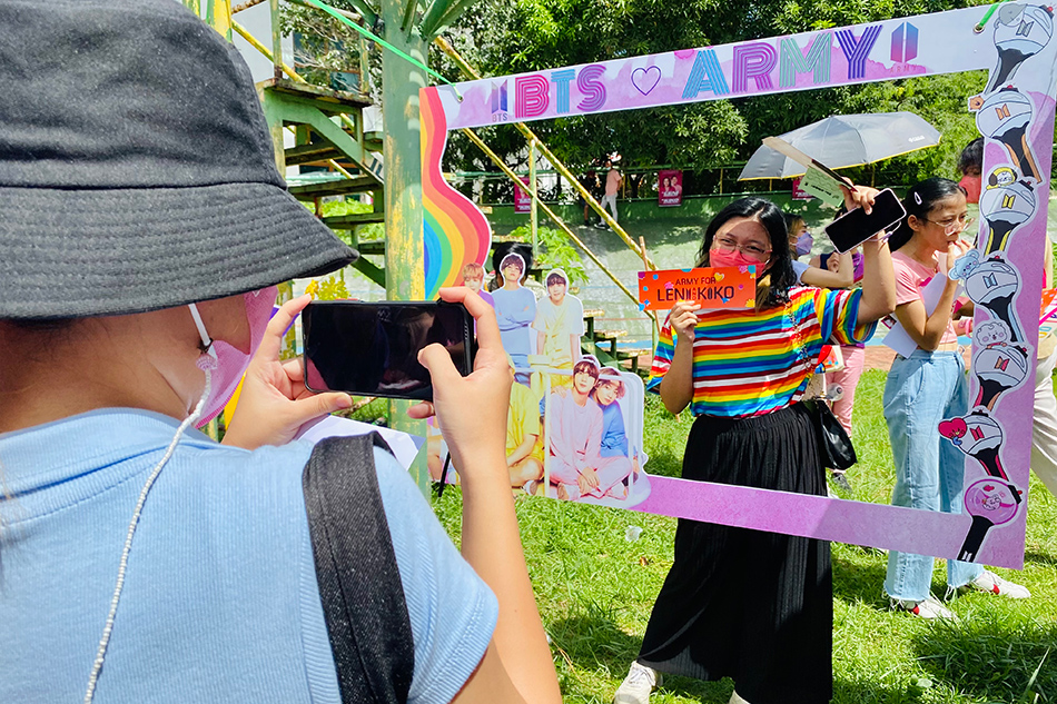 Fans take turns at a makeshift photobooth to express their support for BTS and for the Leni-Kiko tandem on May 1, 2022. Wena Cos, ABS-CBN News