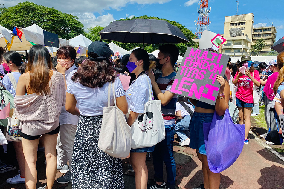 Fans flock around lines of booths offering free campaign materials, idol group merchandise, snacks, and other freebies during the KFiesta: Stan Forever, Stand Together event at the Amoranto Sports Complex on May 1, 2022. Wena Cos, ABS-CBN News