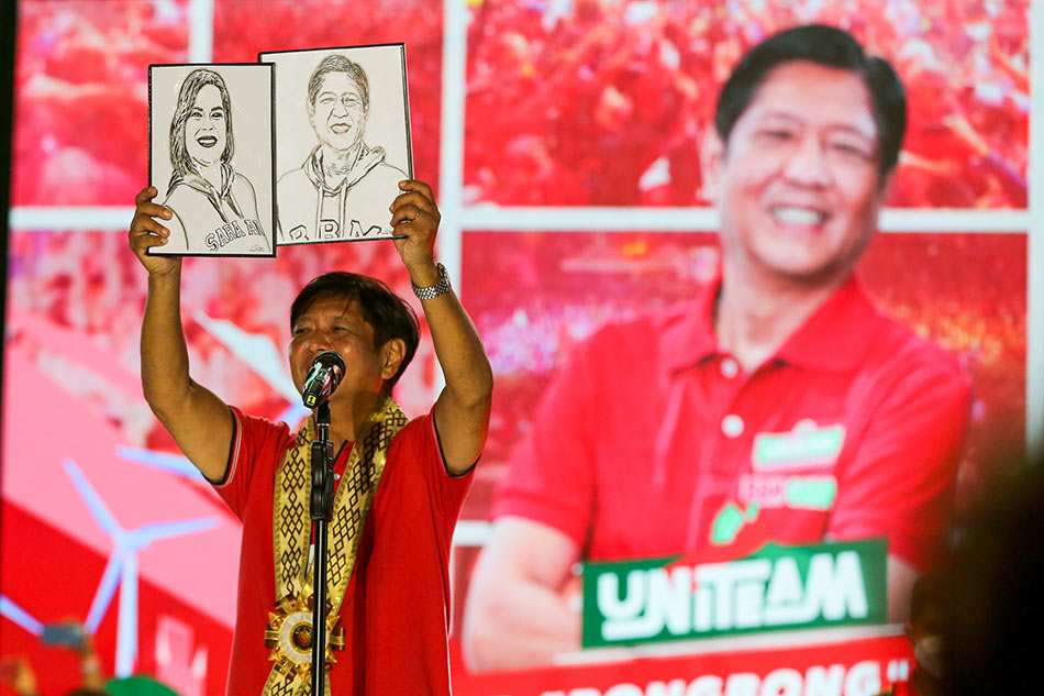 Presidential candidate Ferdinand 'Bongbong' Marcos Jr. greets supporters during a a grand rally at the Lima Commercial Estate along the border of Lipa and Malvar, Batangas on April 20, 2022. Jonathan Cellona, ABS-CBN News.