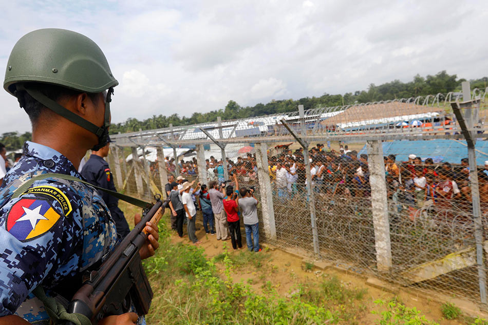 A Myanmar border guard police stands guard  EPA-EFE