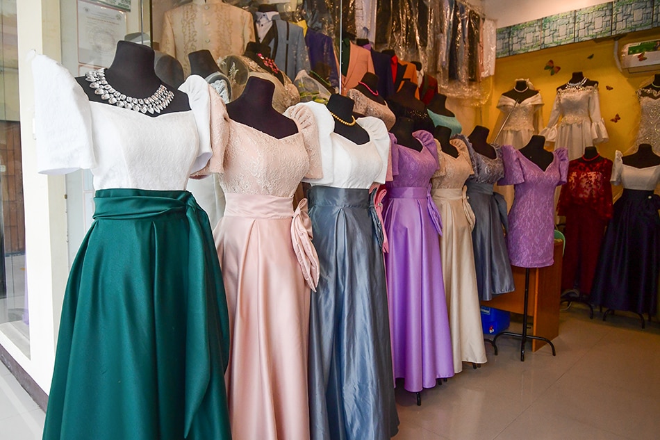Varieties of terno filipiniana dresses go for sale at Disenyo Pandi in Barangay Bagong Barrio, Pandi, Bulacan on June 15, 2022. Mark Demayo, ABS-CBN News
