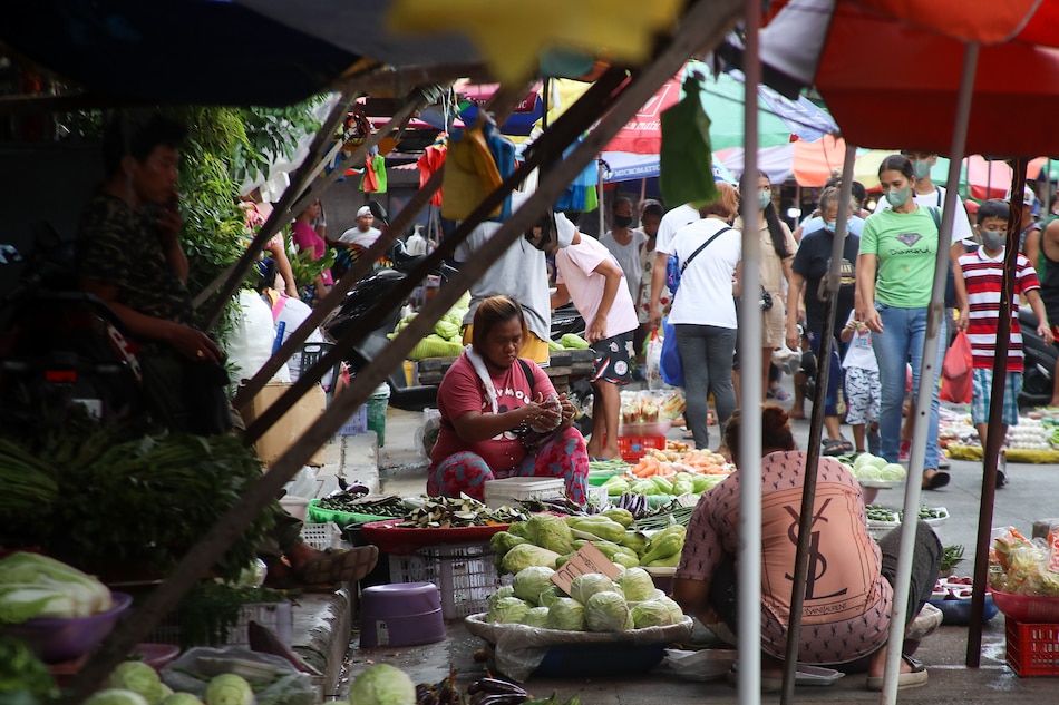 People buy from a road side market ABS-CBN News