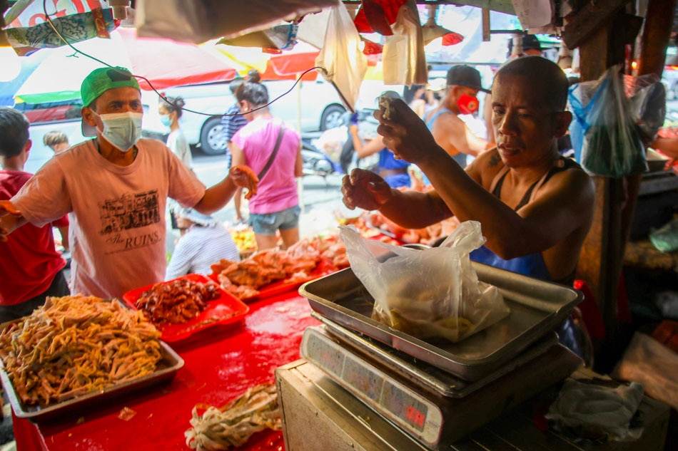 Shopping for meat in Bagong Silang Market