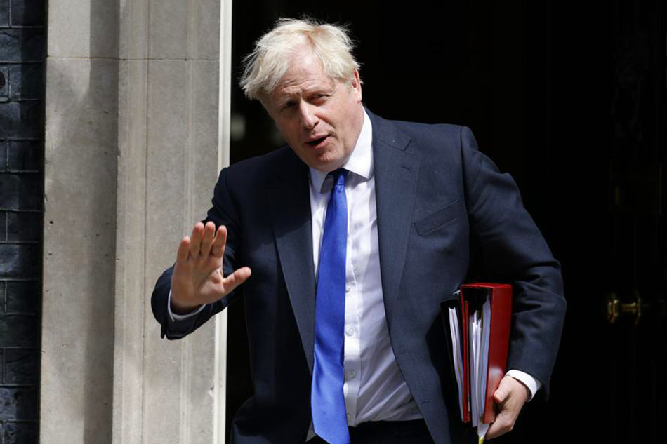 British Prime Minister Boris Johnson leaves 10 Downing Street prior to attending a Prime Minister's Questions session at the Houses of Parliament, in London, Britain, July 6, 2022. Tolga Akmen, EPA-EFE/File