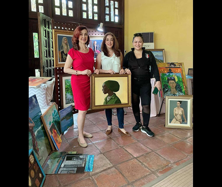 Connie Quirino (middle) with sister Cory (left) and Michaela Phiffer, curator of Fashion Interiors Philippines