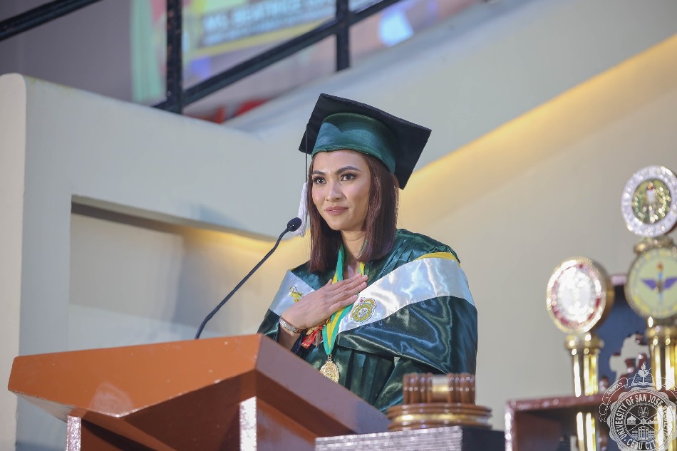 Beatrice Luigi Gomez gives a speech to her fellow graduates as this year