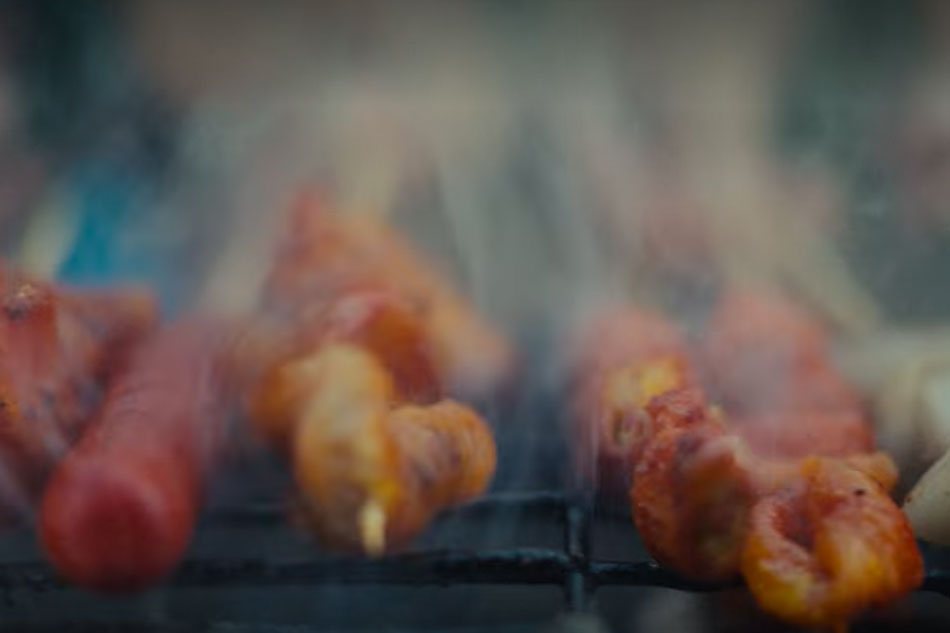 Filipino skewers on a charcoal grill at Dollar Hits. Screengrab from Netflix