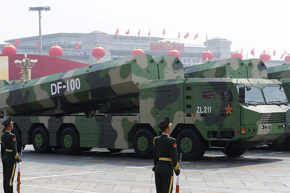 Military vehicles carrying the DF-100 hypersonic cruise missile EPA-EFE/file