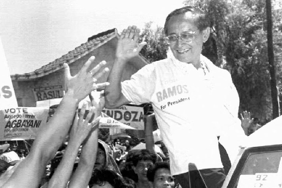Then presidential candidate Fidel Ramos greets supporters while barnstorming in his home province north of Manila on May 7, 1992 as the campaign for that month's national elections nears the homestretch. Ramos, former military chief and defense secretary, is the candidate of then President Corazon Aquino's People Power party. Romeo Gacad, AFP/File