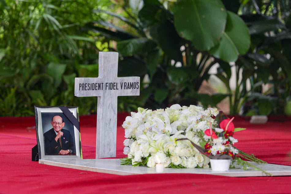 Flowers are offered at the grave of former President  FVR ABS-CBN News