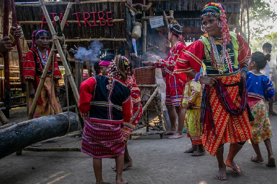 Ata tribe members perform a traditional dance in their tribal house at the Kadayawan Village inside Magsaysay Park in Davao City, Aug. 14, 2018. The Kadayawan Festival is a celebration of diversity of cultures found in Davao City. Manman Dejeto, ABS-CBN News/File 