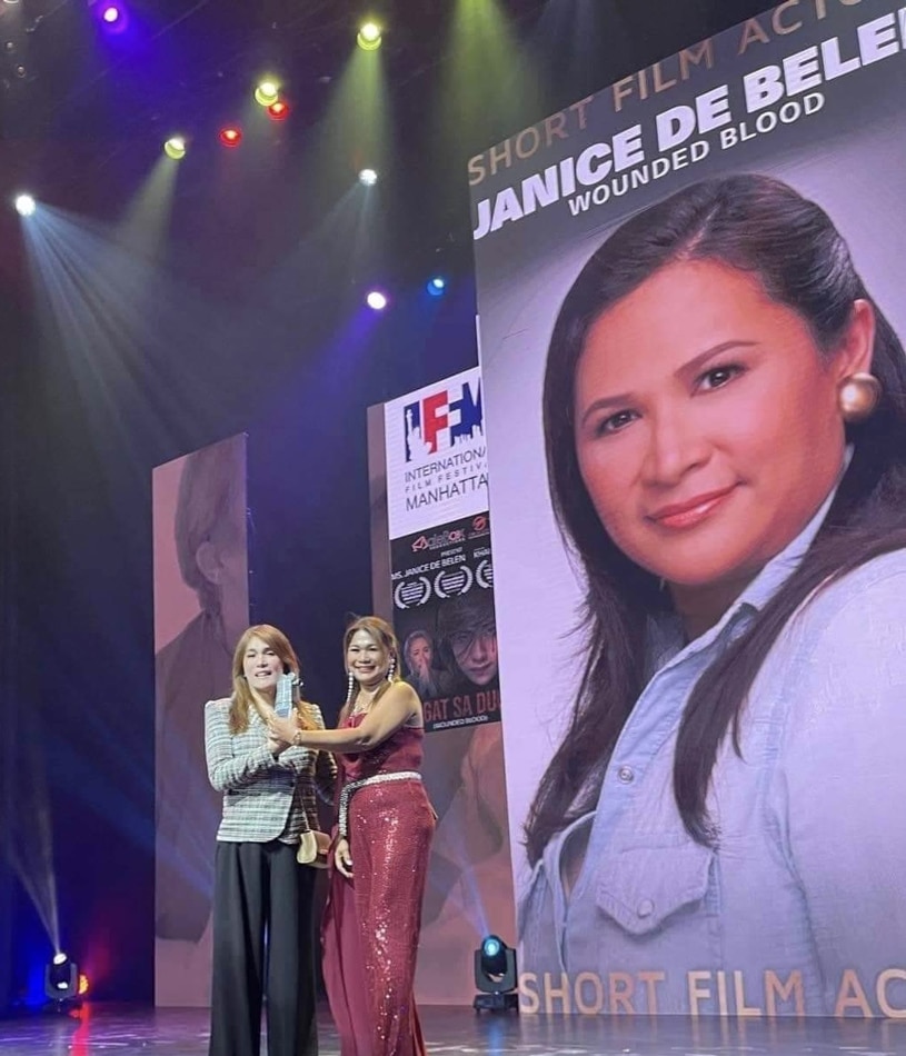 Bambbi Fuentes and Christine Areola, producers of 'Sugat sa Dugo,' received the Best Actress Award for Janice de Belen at the Metropolitan Theater last year.