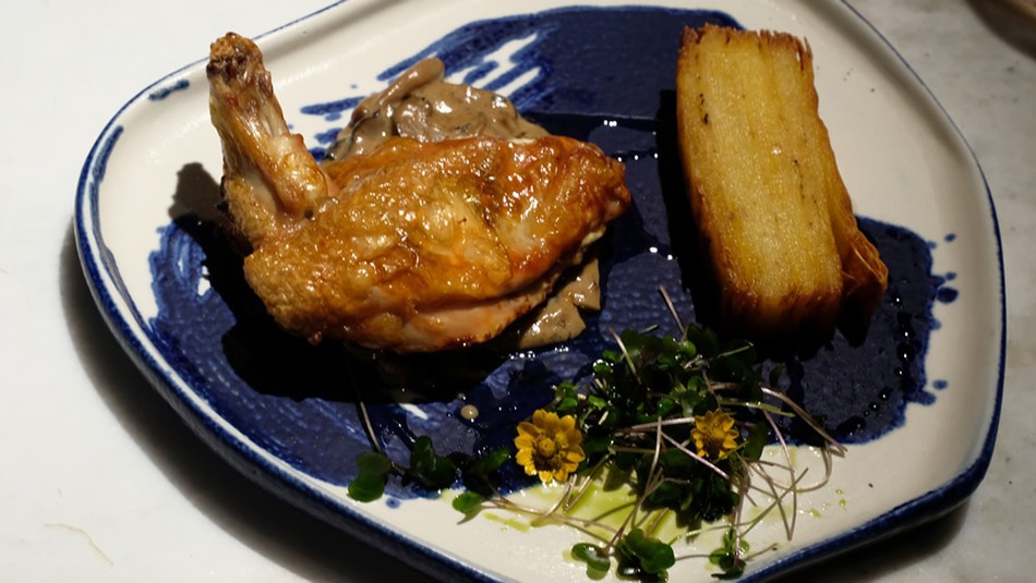 Poulet de Bresse is to chicken, as Iberico is to pork, or Wagyu is to beef. It's a marque of excellence reserved for chicken grown in a small region of France. The kitchen at Somm's Table accompanies this with a wild mushroom gravy and a potato gratin. Jeeves de Veyra