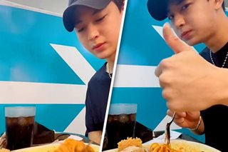 WATCH: iKon’s Yunhyeong enjoys meal in PH fast food resto