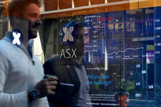 Australia hikes rates less than forecast, boosting stocks