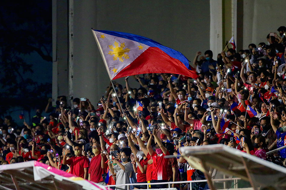 Filipino fans cheer during the finals match between the Philippines and Thailand for the ASEAN Football Federation (AFF) Women’s Championship held at the Rizal Memorial Stadium in Manila on July 17, 2022. George Calvelo, ABS-CBN News