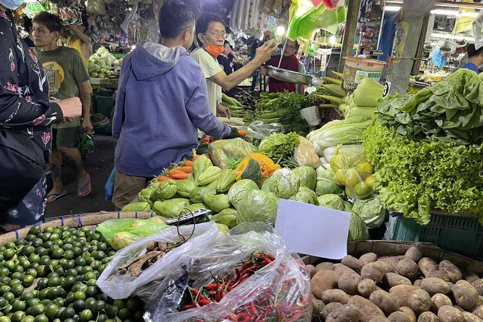 Vegetable and other goods are on display in a market in Metro Manila. Vegetables are among the key food items with notable inflation in October. Warren De Guzman, ABS-CBN News.