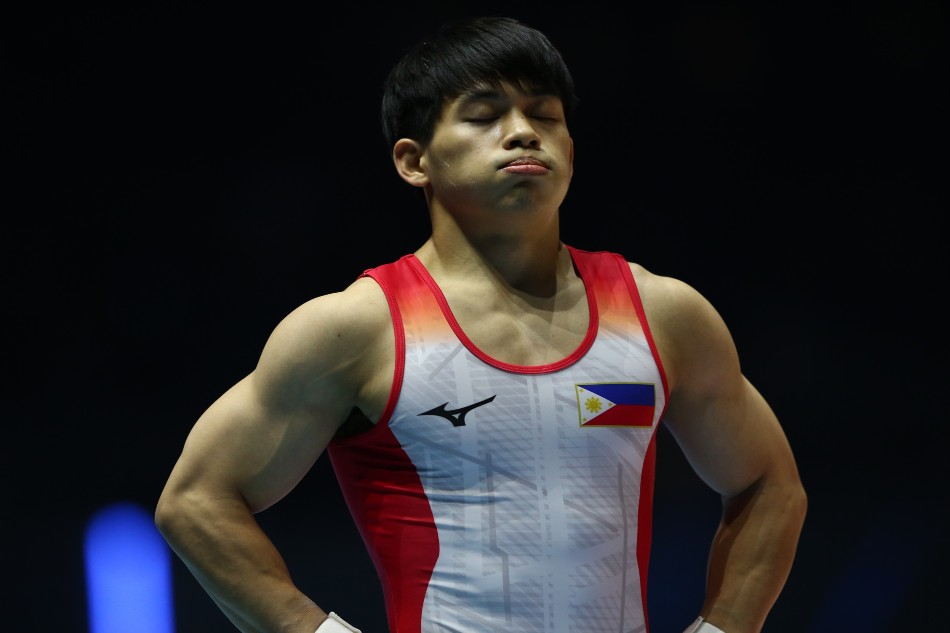 Caloy Yulo reacts after performing on the Floor in the men’s all-around final during the 51st FIG Artistic Gymnastics World Championships in Liverpool, Britain on November 4, 2022. Adam Vaughan, EPA-EFE