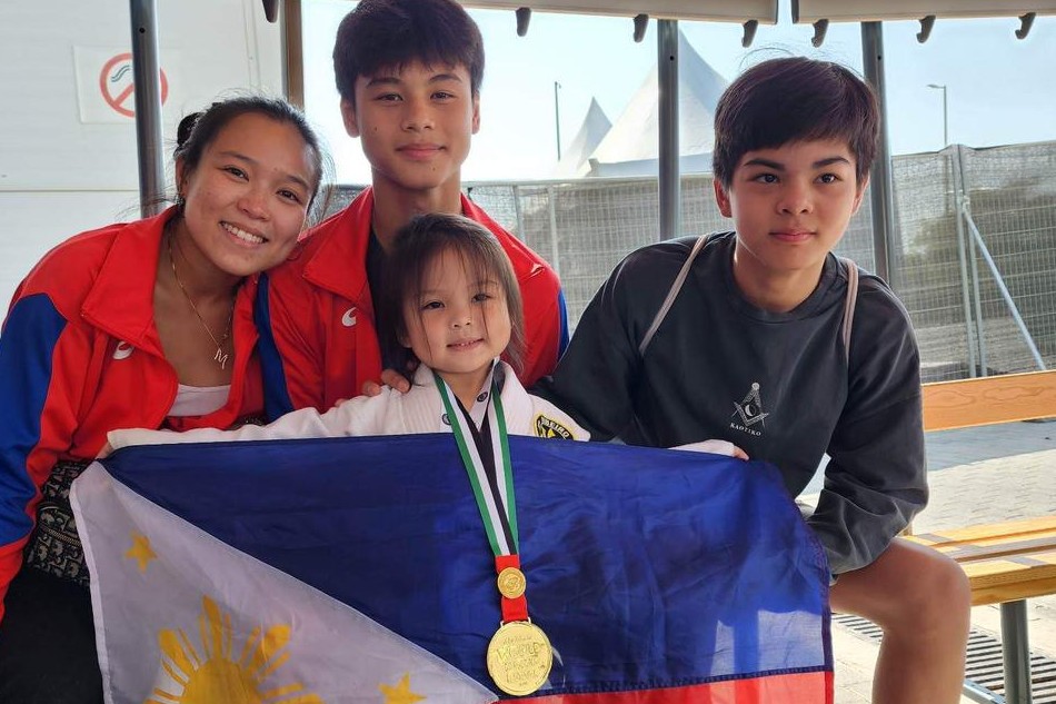 Aleia Aielle M. Aguilar with her mother and older brothers, after winning gold in the Abu Dhabi World Jiu-Jitsu Festival. Aldwin Cosuco, ABS-CBN News