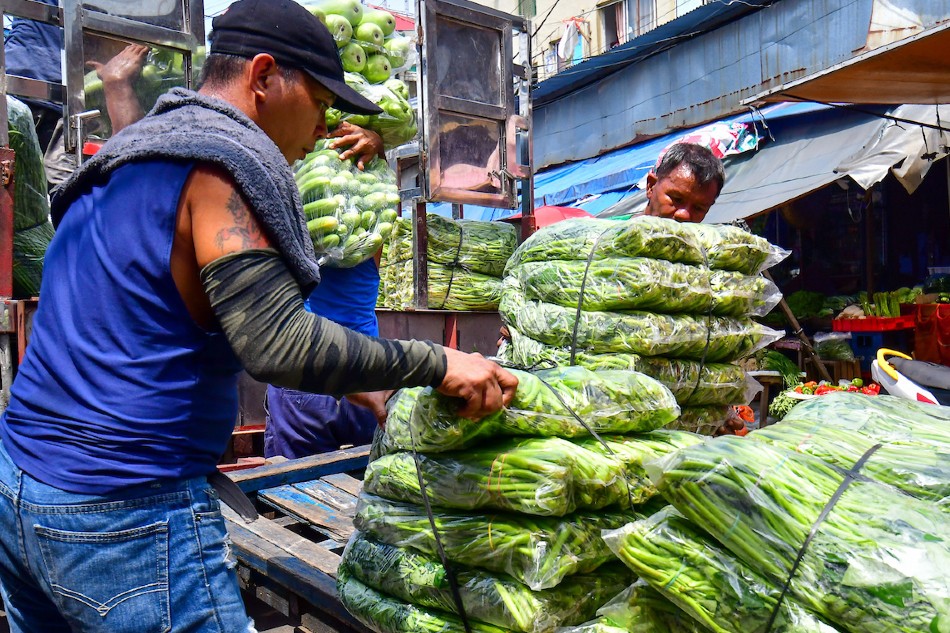 Produce go for sale at a market in Manila on October 12, 2022. Mark Demayo, ABS-CBN News