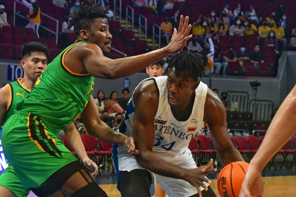 The Ateneo de Manila University (ADMU) and Far Eastern University (FEU) battle during the second round of the UAAP season 85 men