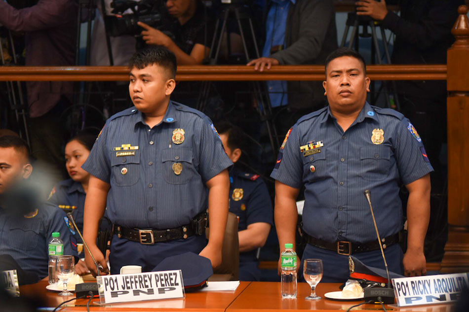 Caloocan police PO1 Jeffrey Perez and PO1 Ricky Arquilita, who were involved in the death of Carl Angelo Arnaiz attend the senate hearing in 2017. George Calvelo. ABS-CBN News