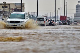 Two dead as Saudi storm closes schools, cuts road to Mecca