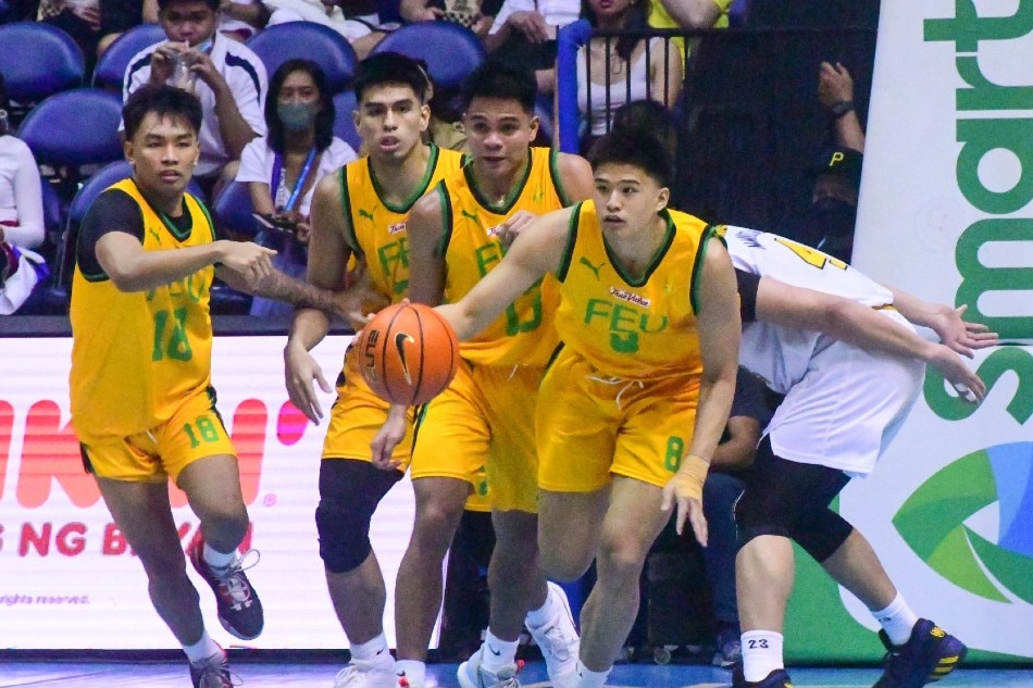 The Far Eastern University (FEU) and University of Santo Tomas (UST) battle during the second round of the UAAP season 85 men's basketball in Quezon City on November 26, 2022. Mark Demayo, ABS-CBN News