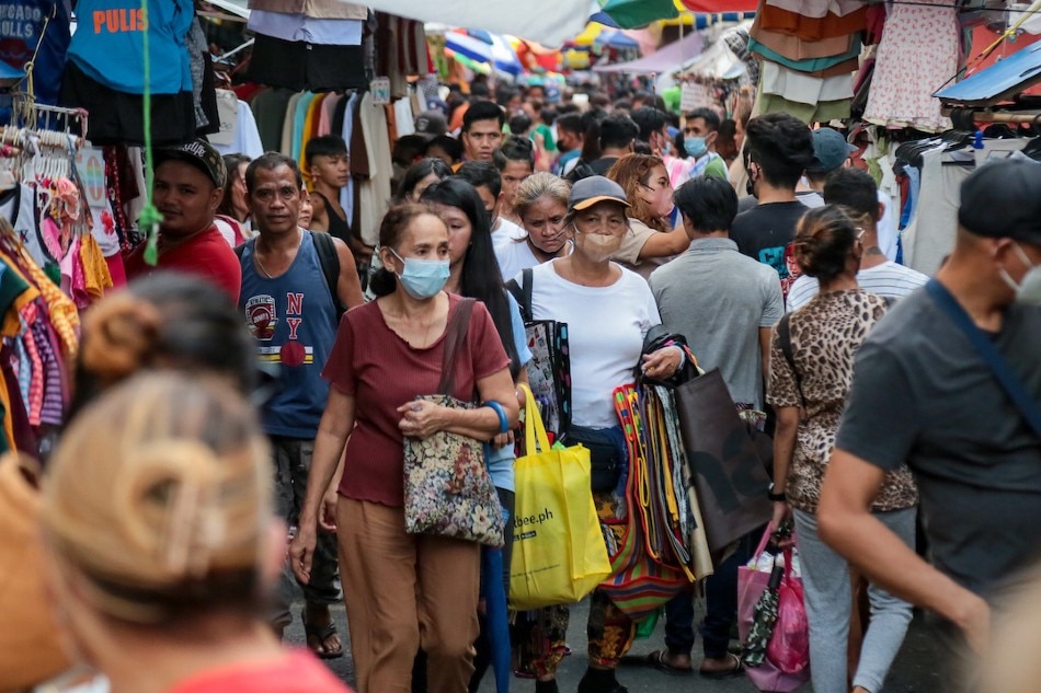 People flock to the Divisoria market to shop for various Christmas decorations and party needs on November 22, 2022. George Calvelo, ABS-CBN News