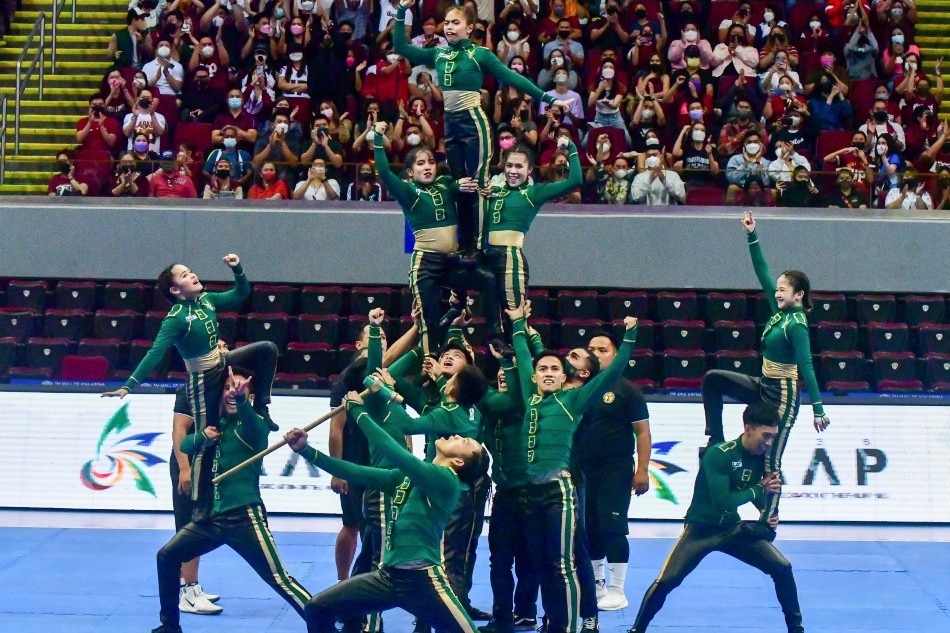 Members of the FEU Cheering Squad perform their routine during the UAAP Season 84 Cheerdance Competition at the Mall of Asia Arena in Pasay City on May 22, 2022. Mark Demayo, ABS-CBN News