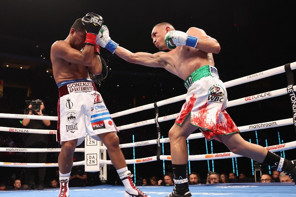 Juan Francisco Estrada (R) of Mexico throws a right on Roman Gonzalez of Nicaragua during their WBC super flyweight title bout at Desert Diamond Arena on December 03, 2022 in Glendale, Arizona. Christian Petersen/Getty Images/AFP
