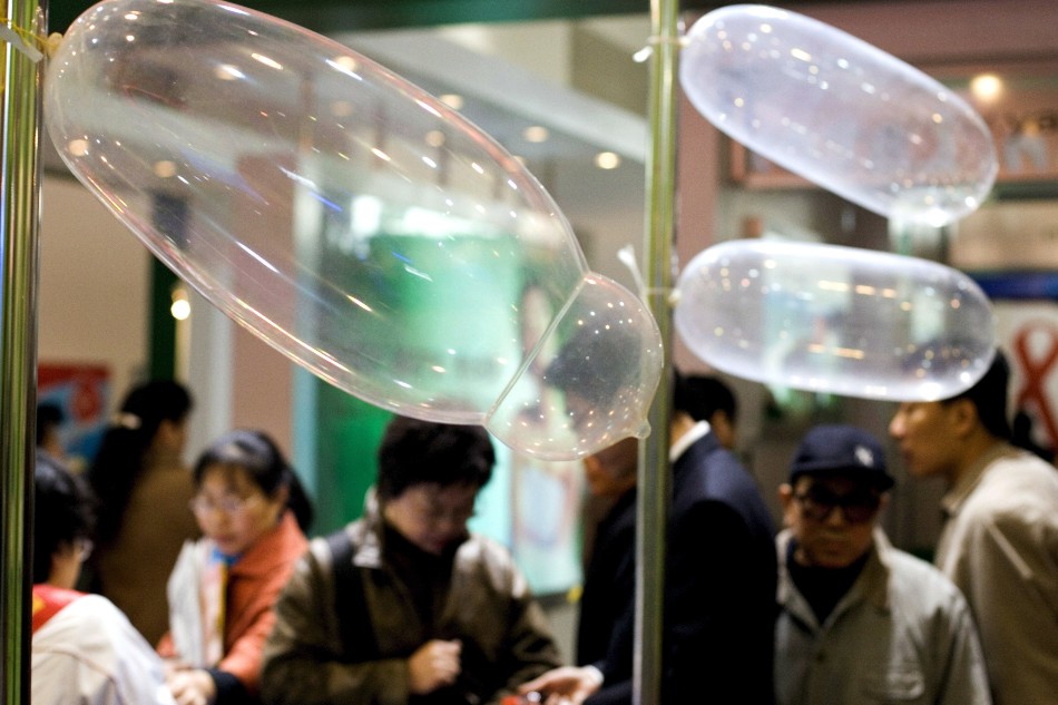 A condom manufacturer displays its products at a reproductive health show in Beijing, China on Nov. 17, 2005. Adrian Bradshaw, EPA/File