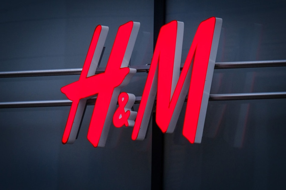 The logo of Swedish clothing company 'H&M' (Hennes & Mauritz) is seen on a store in the city center of Bremen, northern Germany, Jan. 15, 2018. Focke Strangmann, EPA-EFE/File