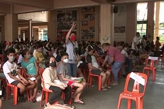 Metro Manila residents flock to COVID-19 vaccination sites amid rising cases