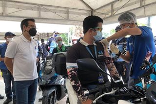 Delivery riders get COVID booster shots in Manila City