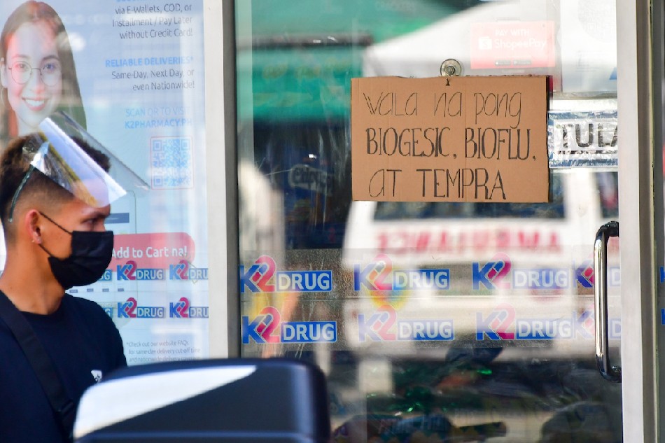 A drugstore in Quezon City puts up a list of unavailable over-the-counter medicines on Jan. 4, 2022 as supplies run short with people stacking up on common medicines for fever, cough and colds associated with COVID-19 sickness. Mark Demayo, ABS-CBN News/File 