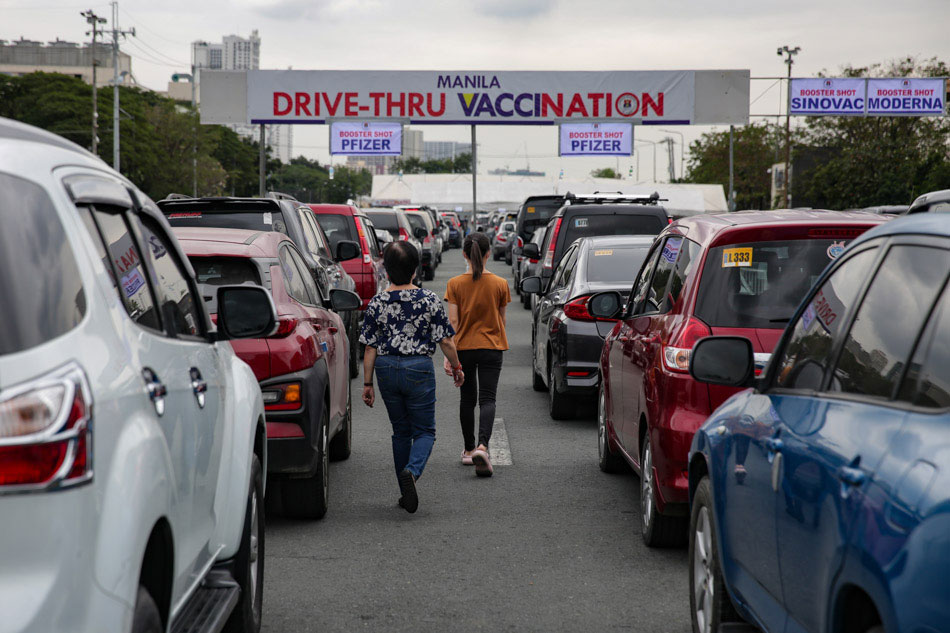 Drive-thru COVID-19 booster vaccination in Manila
