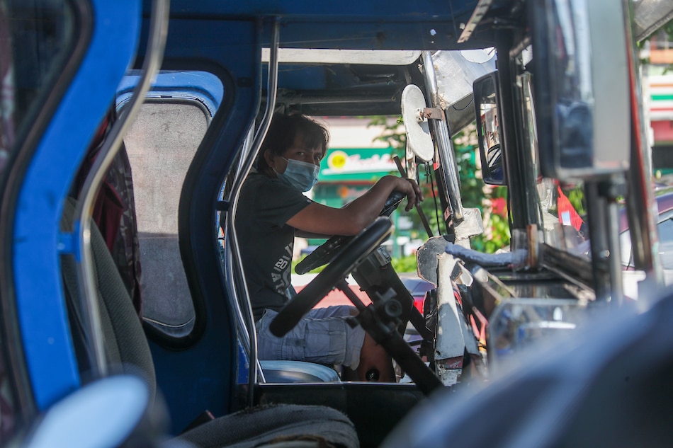 Jeepney drivers wait for passengers along Visayas Avenue in Quezon City on August 17, 2021 as Metro Manila remains under enhanced community quarantine to curb the spread of COVID-19. Jonathan Cellona, ABS-CBN News