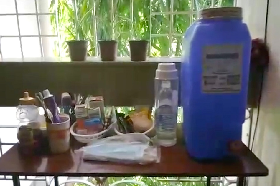 Janice created a makeshift supply table and dirty kitchen at their balcony where she can wash towels and prepare food. Photo courtesy of Janice Tarroza