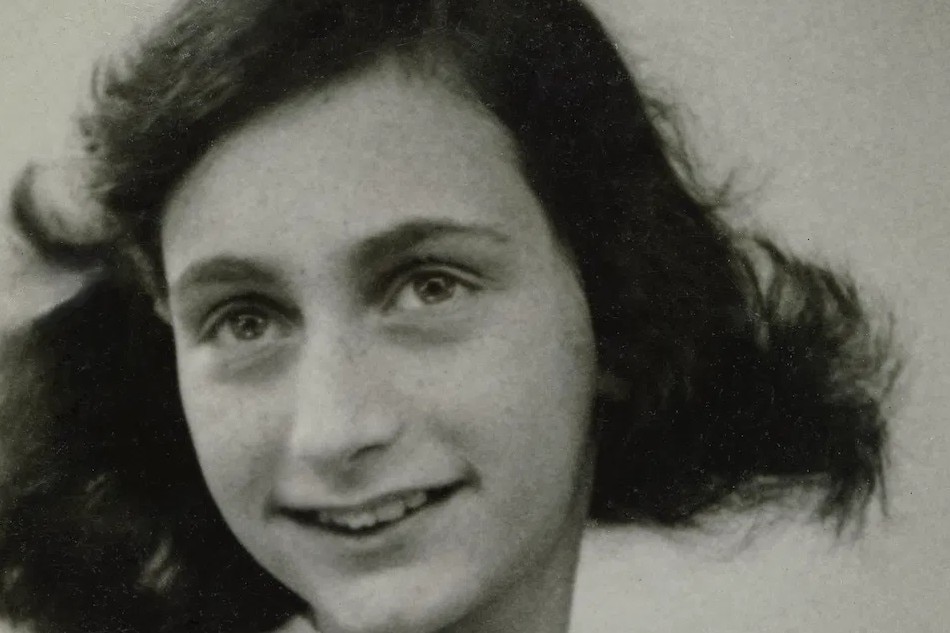 The last known photograph of Anne taken in May 1942, taken at a passport photo shoot. Photo collection Anne Frank House, Amsterdam. Photo by Public Domain Work.