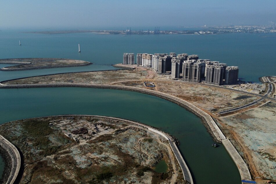  An aerial view shows the 39 buildings developed by China Evergrande Group that authorities have issued demolition order on, on the manmade Ocean Flower Island in Danzhou, Hainan province, China January 6, 2022. Picture taken with a drone. Aly Song, Reuters/File