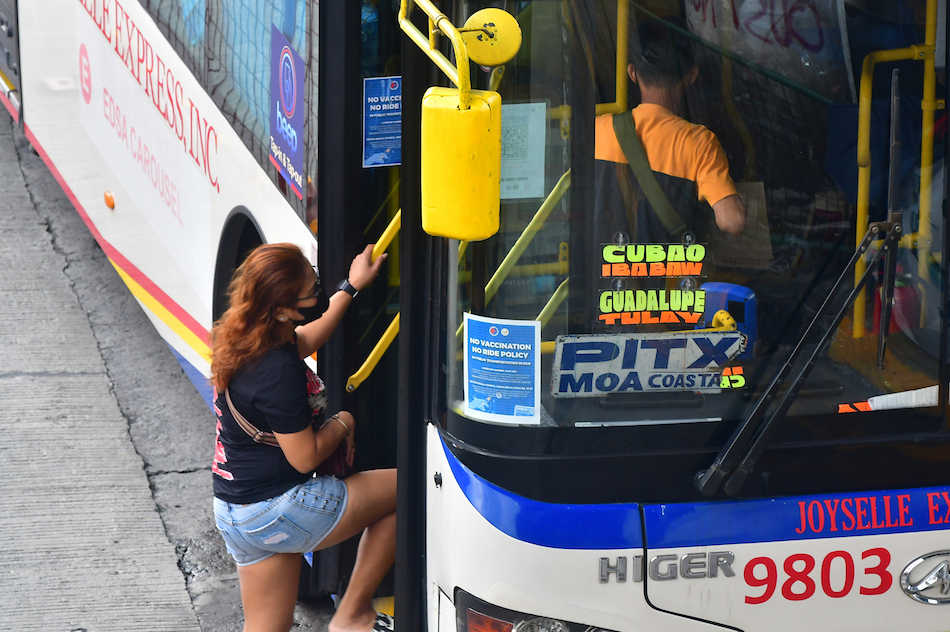 Passengers ride the EDSA Bus Carousel in Quezon City on Jan. 26, 2022. Mark Demayo, ABS-CBN News