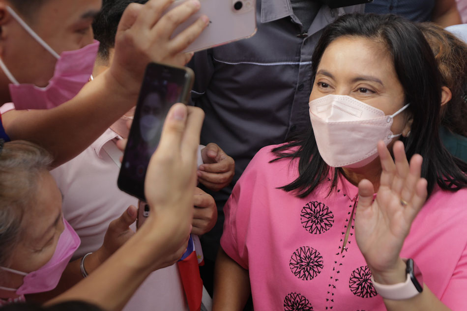 Vice President Leni Robredo greets supporters mostly clad in pink during her visit at the Guagua Municipal Hall in Guagua, Pampanga officials on Feb. 3, 2022. OVP/Handout