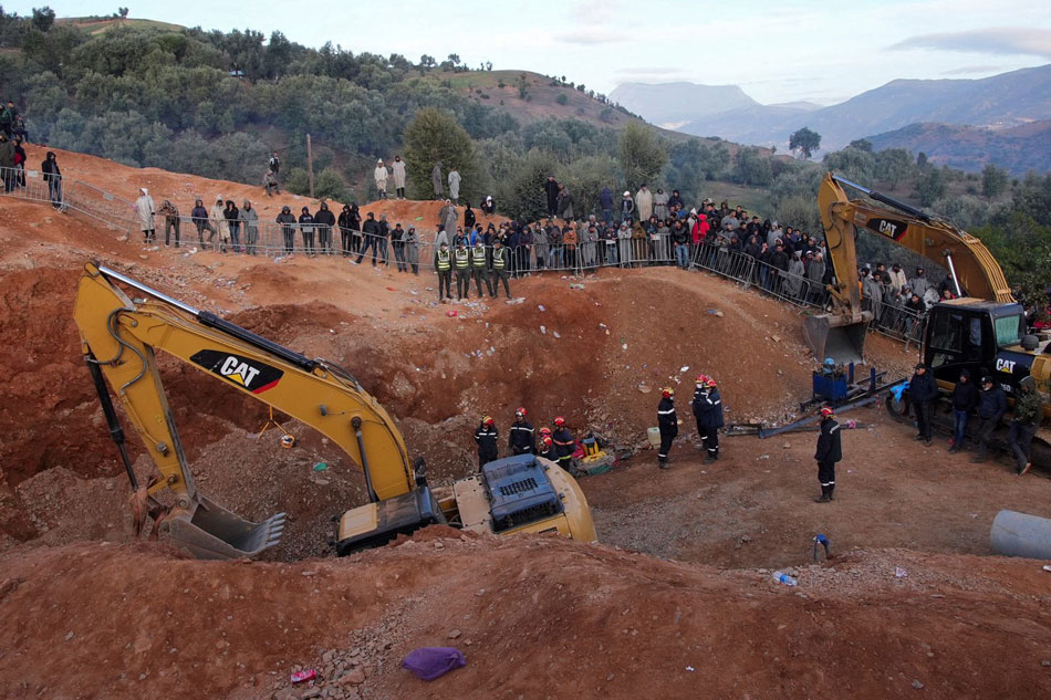 Rescuers work to reach a five-year old boy trapped in a well in the northern hill town of Chefchaouen, Morocco February 5, 2022. Thami Nouas, Reuters