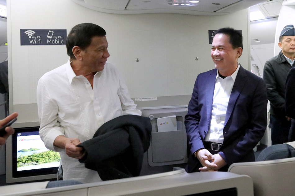 President Rodrigo Duterte with Kingdom of Jesus Christ sect founder Apollo Quiboloy onboard a plane bound for Davao City on October 5, 2019. King Rodriguez, Presidential Photo/File