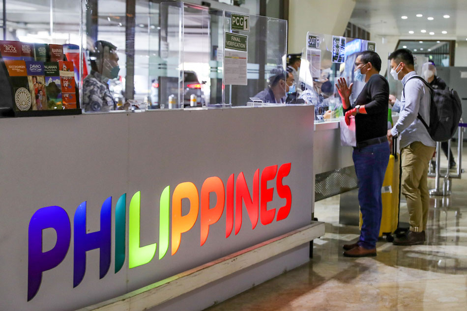  Foreigners arrive at the Ninoy Aquino International Airport in Pasay City on February 10, 2022, the first day the country reopened its borders to fully vaccinated international travelers. Jonathan Cellona, ABS-CBN News/file