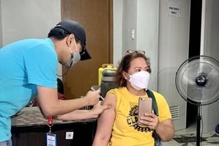 Barangay workers in QC start house-to-house COVID vaccination campaign