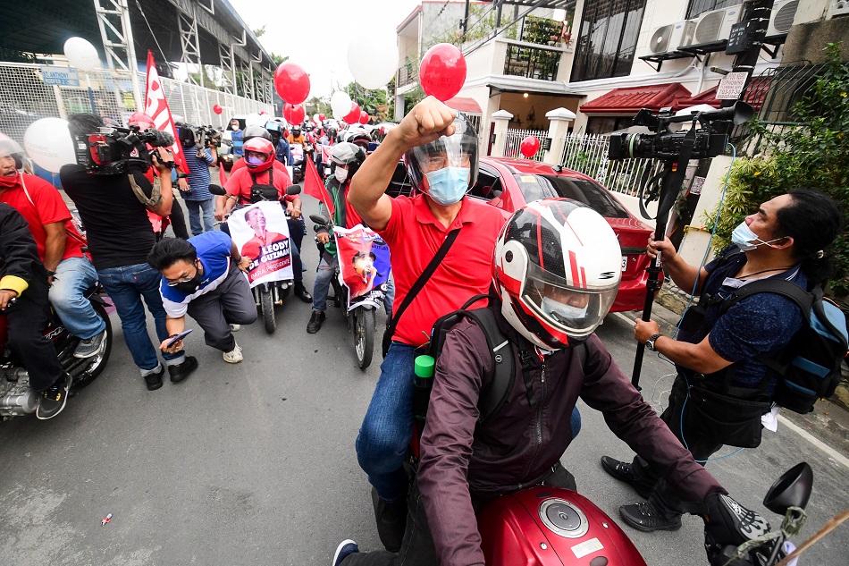 Presidential aspirant Ka Leody de Guzman begins his motorcade from his home in Cainta, Rizal, riding behind a motorcycle en route to the ABS-CBN compound in Quezon City on February 8, 2022. COMELEC recently announced that his team has not secured a permit for his proclamation rally at the Bantayog ng Mga Bayani in Quezon City set later in the day. Mark Demayo, ABS-CBN News