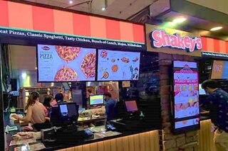 Shakey's opens store in Singapore